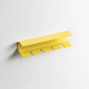 Suport periute de dinti SPIN Jaw, 16cm, albastru galben Suport periute de dinti SPIN Jaw, 16cm, albastru galben