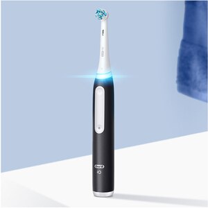 Set 2 Periute de dinti electrice ORAL-B iO3, 8800 miscari/min, Curatare 3D, Timer, 3 programe, 2 capate, negru-albastru Set 2 Periute de dinti electrice ORAL-B iO3, 8800 miscari/min, Curatare 3D, Timer, 3 programe, 2 capate, negru-albastru